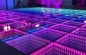 LED infinity dance floor with vibrant purple and blue lighting used for immersive brand activation events