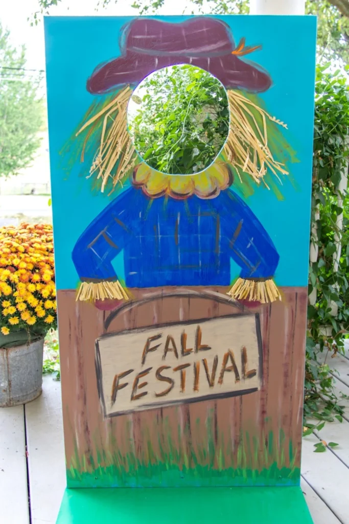 Fall festival themed booth farmer cutout.