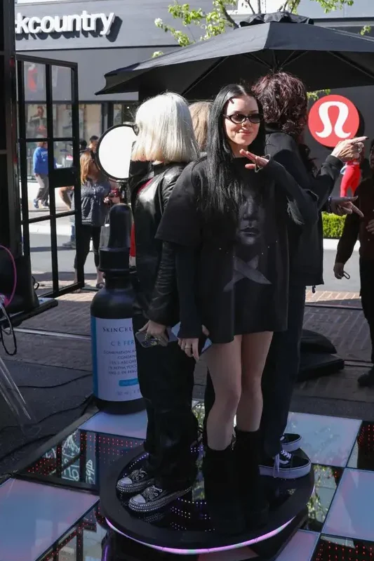 Two Girls Standing on top of a 360 Video Booth Platform at Skinceuticals annual event