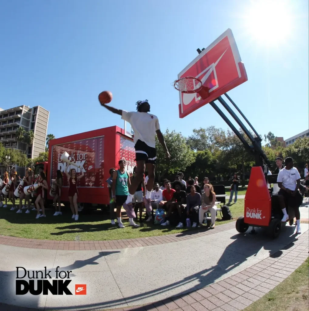 Nike's 'Dunk for DUNK' branded basketball activation with custom court, branded signage, and crowd engagement at outdoor event