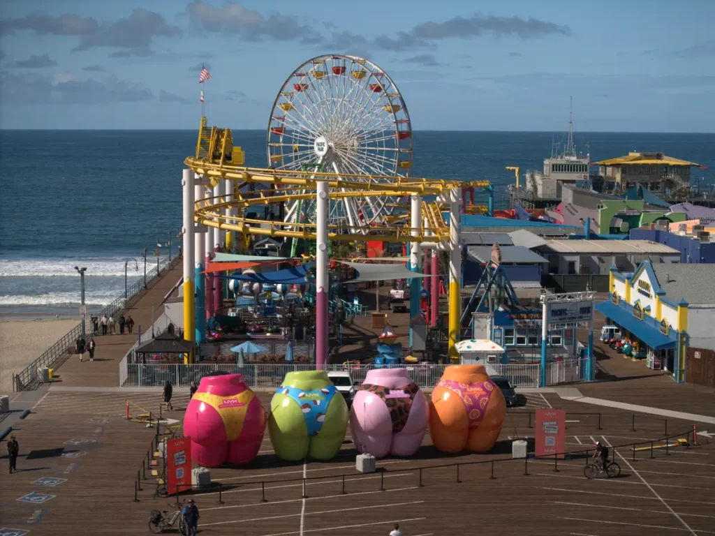 Drone aerial photo of a beachfront boardwalk and amusement park for commercial branding