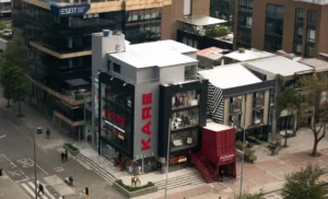 Commercial aerial photography of a modern retail storefront showcasing a flagship location for marketing, branding, and grand opening promotions